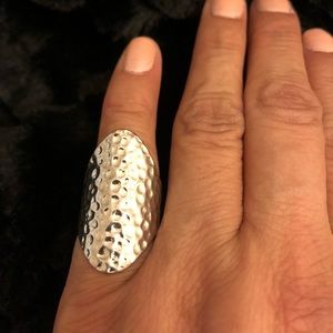 Silver hammered ring.